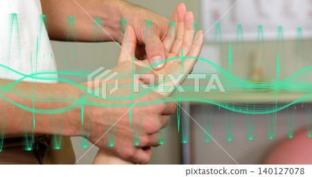 Holding male caregiver hands, checking wrist at clinic, showing white top, pink ball and waveform 140127078