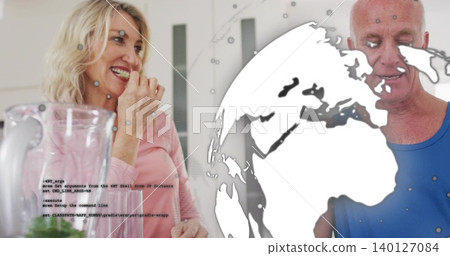 Smiling couple in pink and blue shirts talking at dining table with pitcher and globe overlay Smiling couple in pink and blue shirts talking at dining table with pitcher and globe overlay 140127084
