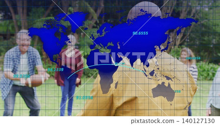 Standing person wearing mustard jacket facing others on park lawn, with blue world map overlay 140127130