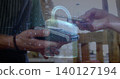 Image of network security padlock over people using payment terminal 140127194