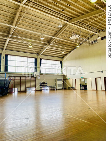 High ceilings and a spacious gymnasium interior (vertical composition) High ceilings and a spacious gymnasium interior (vertical composition) 140127210