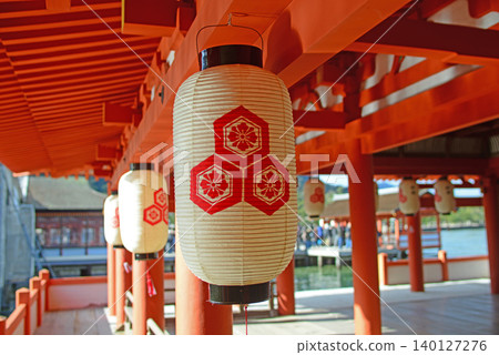 Lanterns bearing the shrine crest in the corridor of Itsukushima Shrine in Miyajima, Aki Province - 1 Lanterns bearing the shrine crest in the corridor of Itsukushima Shrine in Miyajima, Aki Province - 1 140127276