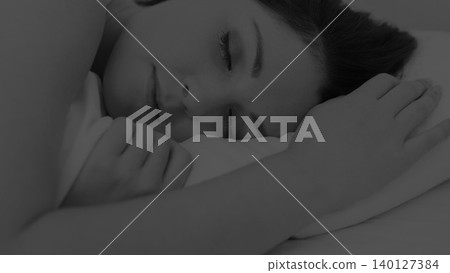 Woman is sleeping on pillow in soft monochrome illustration, showing wellness concept with bedsheet Woman is sleeping on pillow in soft monochrome illustration, showing wellness concept with bedsheet 140127384
