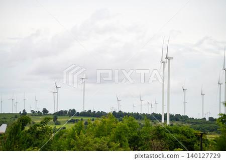 Wind energy. Wind power. Sustainable, renewable energy. Wind turbines generate electricity. Wind farm. Sustainable resources. Sustainable development. Green technology for energy sustainability. 140127729