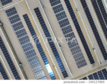 Solar-powered warehouse facility. Modern distribution center with rooftop solar panel. Eco-friendly warehouse. Sustainable logistics solutions for reduced carbon footprint. Sustainable energy. Solar-powered warehouse facility. Modern distribution center with rooftop solar panel. Eco-friendly warehouse. Sustainable logistics solutions for reduced carbon footprint. Sustainable energy. 140127969