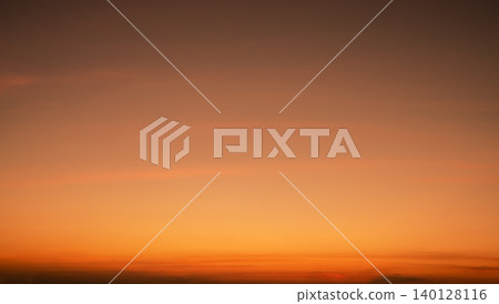 Calming orange sunset glows above peaceful horizon in summer. Peaceful sky at dusk create serene atmosphere for relaxation meditation background nature landscape scenic view summer evening tranquility Calming orange sunset glows above peaceful horizon in summer. Peaceful sky at dusk create serene atmosphere for relaxation meditation background nature landscape scenic view summer evening tranquility 140128116