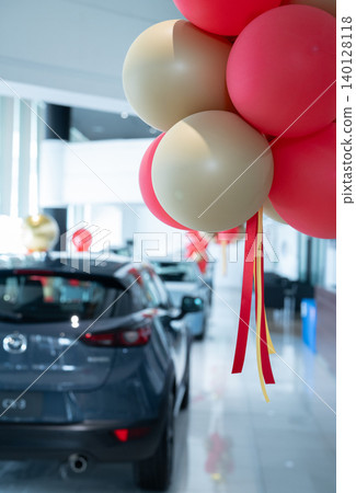 Car parked in luxury showroom. Car dealership office. Car showroom business. New car parked in modern showroom. Auto for sale and rent business. Automobile leasing and insurance. Electric automobile. Car parked in luxury showroom. Car dealership office. Car showroom business. New car parked in modern showroom. Auto for sale and rent business. Automobile leasing and insurance. Electric automobile. 140128118