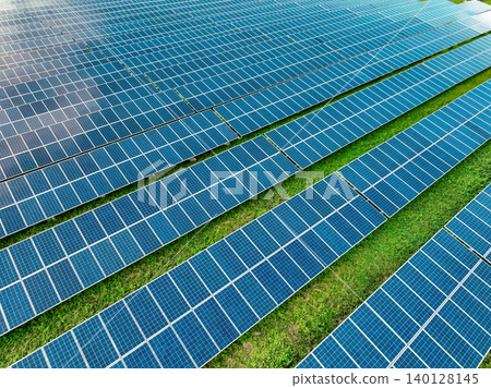 Solar farm and sun light. Solar power for green energy. Sustainable renewable energy. Photovoltaic power station. Solar panel technology. Energy sustainability. Eco-friendly green energy production. Solar farm and sun light. Solar power for green energy. Sustainable renewable energy. Photovoltaic power station. Solar panel technology. Energy sustainability. Eco-friendly green energy production. 140128145