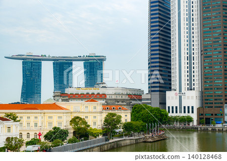 Download Skyline of Singapore financial district behind the Singapore River Download Skyline of Singapore financial district behind the Singapore River 140128468