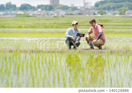 Men using tablets for farming Men using tablets for farming 140128866