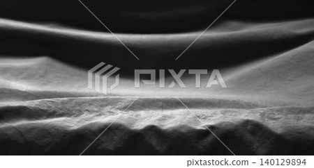 A beautiful black draped fabric in focus in the foreground. A beautiful black draped fabric in focus in the foreground. 140129894