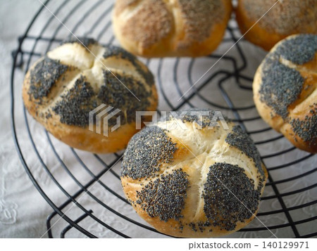 Kaiser rolls, freshly baked 140129971
