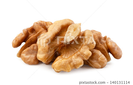 Pile of peeled walnuts close-up on a white background. Isolated Pile of peeled walnuts close-up on a white background. Isolated 140131114