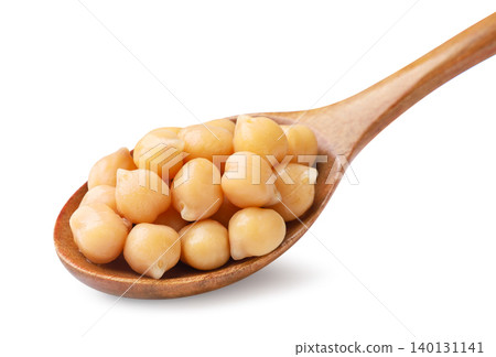 Boiled chickpeas in a wooden spoon on a white. Isolated Boiled chickpeas in a wooden spoon on a white. Isolated 140131141