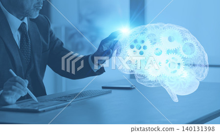 A man working in an office and the concept of AI technology A man working in an office and the concept of AI technology 140131398