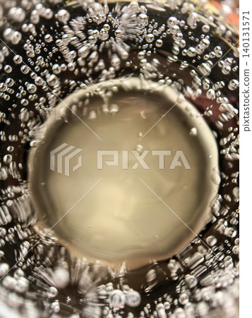 Abstract macro bubbles in carbonated beverage liquid Abstract macro bubbles in carbonated beverage liquid 140131571