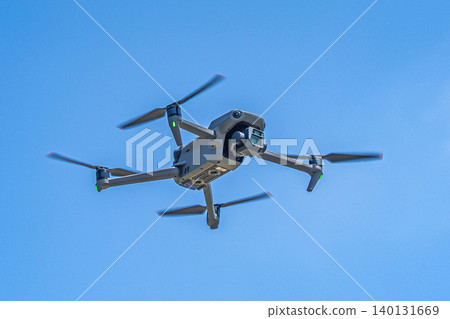 Drone flying blue sky Drone flying blue sky 140131669