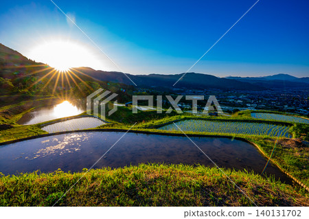 [Nagano Prefecture] Obasute Rice Terraces - Rice Planting Season - Sunset 140131702