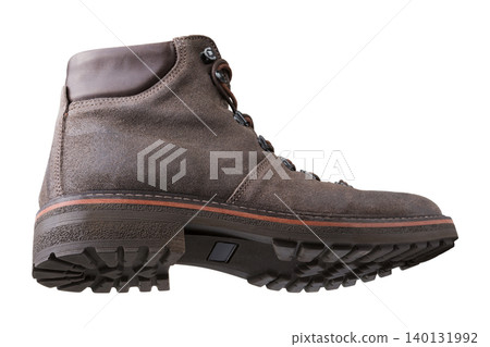 Men brown suede hybrid sneaker boot isolated on white background. Casual winter leather ankle hiking boot with rugged sole, side view. 140131992