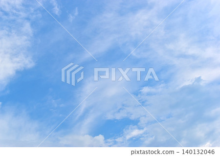 beautiful blue sky and white fluffy group of clouds with sunrise in the morning, natural background beautiful blue sky and white fluffy group of clouds with sunrise in the morning, natural background 140132046