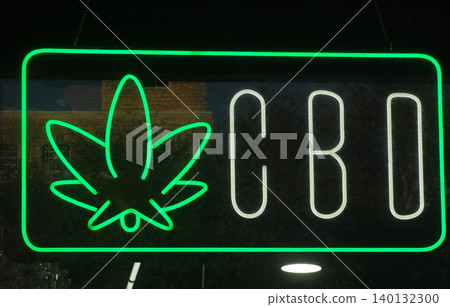 Neon Sign in Window of Vape Shop 140132300