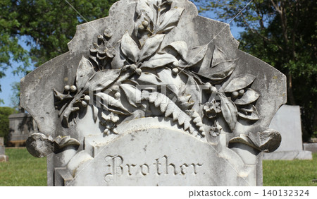 Close up of Historic Headstone With Floral Design in Rural East TX Cemetery Close up of Historic Headstone With Floral Design in Rural East TX Cemetery 140132324