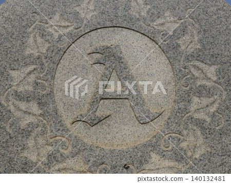 Letter A With Leaves Engraved on Historic Headstone Letter A With Leaves Engraved on Historic Headstone 140132481