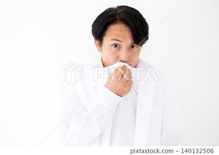 Middle-aged man concerned about body odor Middle-aged man concerned about body odor 140132506