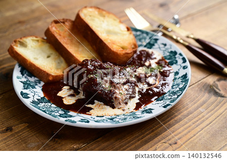 Venison stewed in red wine Venison stewed in red wine 140132546