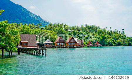 Beautiful view of the resort on the tropical beach, West Halmahera, North Maluku Beautiful view of the resort on the tropical beach, West Halmahera, North Maluku 140132659
