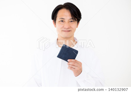 A middle-aged man carrying a wallet A middle-aged man carrying a wallet 140132907