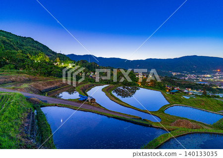 [Nagano Prefecture] Obasute Rice Terraces: Stars reflected in the rice paddies (Stars in each rice field) 140133035