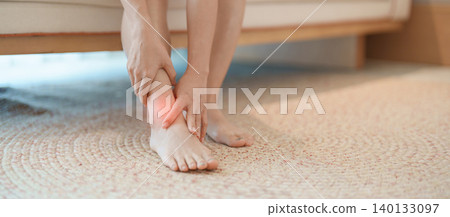 woman having leg pain due to Ankle Sprains or Achilles Tendonitis and Shin Splints ache. injury, hyperuricemia disease and Gout. Health care and medical treatment  concepts 140133097