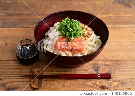 Udon noodles with grated yam, natto (fermented soybeans), and spicy cod roe. Udon noodles with grated yam, natto (fermented soybeans), and spicy cod roe. 140135960