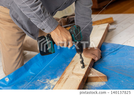 Craftsmen who use power tools Craftsmen who use power tools 140137825
