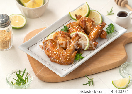 Chicken wings lemon honey teriyaki BBQ Teriyaki chicken wings honey pickled けチキンウィング 140138285