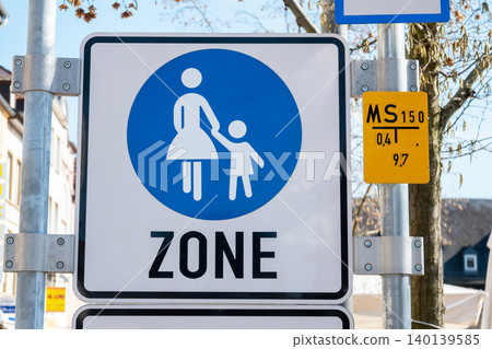 Warning traffic sign for wallking zone in the big city. Blue and white traffic road sign board. 140139585