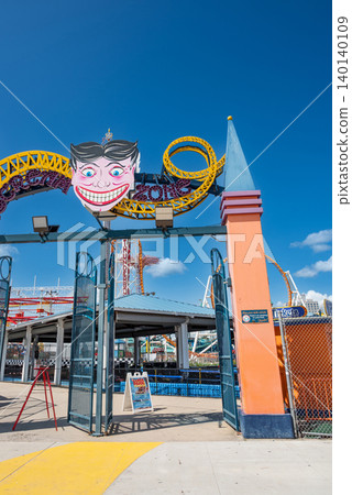 New york, usa august 21,2024. Scream zone entrance with the iconic smiling face, attracting visitors to the thrilling amusement rides at luna park in coney island, new york New york, usa august 21,2024. Scream zone entrance with the iconic smiling face, attracting visitors to the thrilling amusement rides at luna park in coney island, new york 140140109