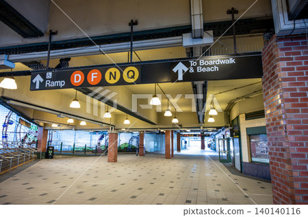 New york, usa august 21,2024. Coney island stillwell avenue subway platform with directional signs pointing to boardwalk and beach, empty summer transit hub New york, usa august 21,2024. Coney island stillwell avenue subway platform with directional signs pointing to boardwalk and beach, empty summer transit hub 140140116