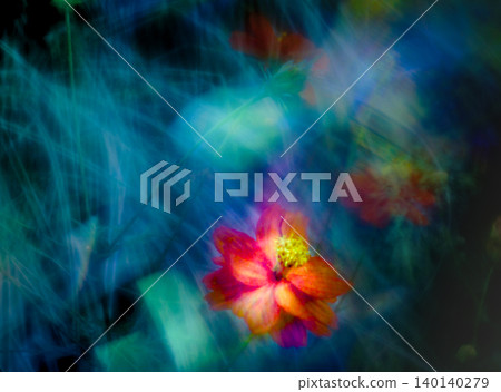 Multiple exposures of flowers in a camera, creating a fantastical image enveloped in a dark blue light. 140140279