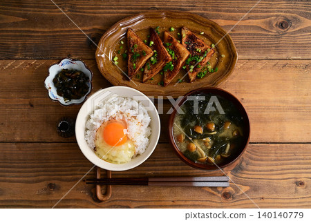 One soup and one dish: Grilled fish cake with butter and soy sauce One soup and one dish: Grilled fish cake with butter and soy sauce 140140779