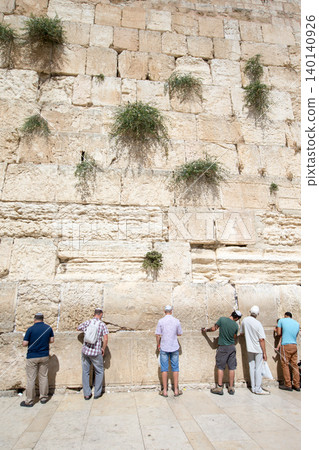 ERUSALEM, ISRAEL - June 24, 2015 : Jewish worshipers pray at Wailing Wall , Israel ERUSALEM, ISRAEL - June 24, 2015 : Jewish worshipers pray at Wailing Wall , Israel 140140926