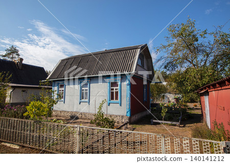 Small country house with a plot. Typical houses given in the post-Soviet space. Small country house with a plot. Typical houses given in the post-Soviet space. 140141212