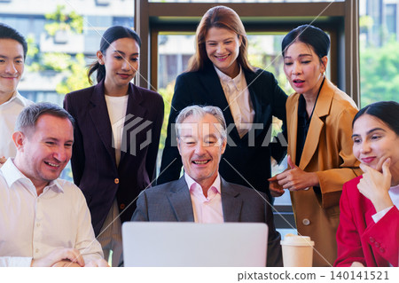 Successful business win with happy team applauding and cheering 140141521