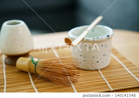 Traditional Matcha green tea set with bamboo whisk and bowl Traditional Matcha green tea set with bamboo whisk and bowl 140141548