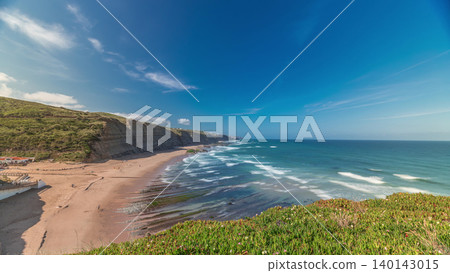 Panorama showing Magoito Beach on Atlantic ocean aerial timelapse, beautiful sandy beach on Sintra coast, Lisbon district, Portugal Panorama showing Magoito Beach on Atlantic ocean aerial timelapse, beautiful sandy beach on Sintra coast, Lisbon district, Portugal 140143015