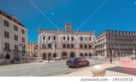 Rossio station in Lisbon timelapse hyperlapse. Front view with zebra crossing and street traffic. Rossio station in Lisbon timelapse hyperlapse. Front view with zebra crossing and street traffic. 140143018