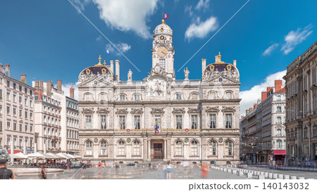 Hyperlapse of Hotel de Ville de Lyon, the historic city hall of Lyon, France. People stroll near the fountain on the square timelapse. Hyperlapse of Hotel de Ville de Lyon, the historic city hall of Lyon, France. People stroll near the fountain on the square timelapse. 140143032