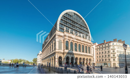 Hyperlapse of Lyon's opera house featuring neoclassical architecture combined with a modern glass dome roof. France Hyperlapse of Lyon's opera house featuring neoclassical architecture combined with a modern glass dome roof. France 140143033