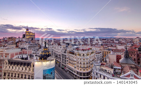 Panoramic aerial view of Gran Via timelapse before sunset, Skyline Old Town Cityscape, Metropolis Building, capital of Spain 140143045